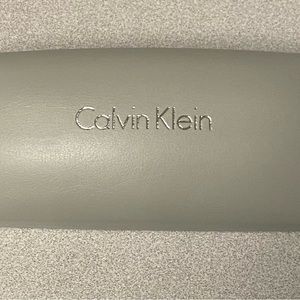Calvin Klein Gray Hard Eyeglass Case & Cleaning Cloth/ Unisex